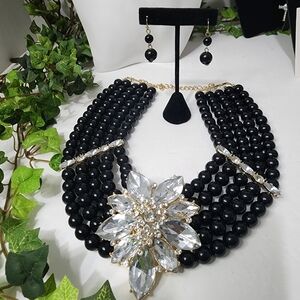 5 Strand Black Bead Necklace with Large Crystal Flower and Earrings Set